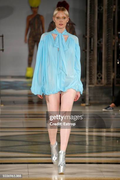 Model walks the runway at the Pam Hogg Show during London Fashion Week September 2018 at XXXX on September 14, 2018 in London, England.