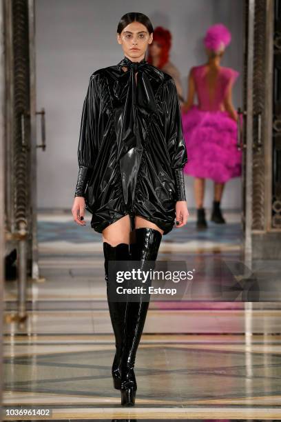 Model walks the runway at the Pam Hogg Show during London Fashion Week September 2018 at XXXX on September 14, 2018 in London, England.