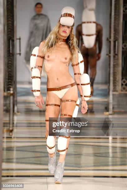 Model walks the runway at the Pam Hogg Show during London Fashion Week September 2018 at XXXX on September 14, 2018 in London, England.