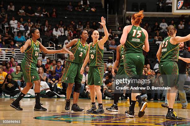 The Seattle Storm come together at halftime of their game against the Los Angeles Sparks during Game Two of the Western Conference Semifinals during...