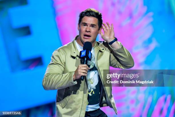 Adam Devine speaks on stage during the 2018 WE Day Toronto Show at Scotiabank Arena on September 20, 2018 in Toronto, Canada.