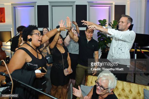 Justin Tranter and members of his graduating class at the Justin Tranter Recording Studio ribbon cutting at The Chicago Academy For The Arts on...