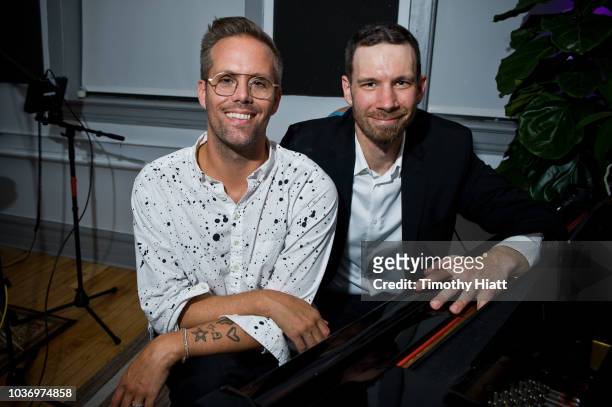 Justin Tranter and head of the Chicago Academy For The Arts Jason Patera pose for a portrait at the Justin Tranter Recording Studio ribbon cutting at...