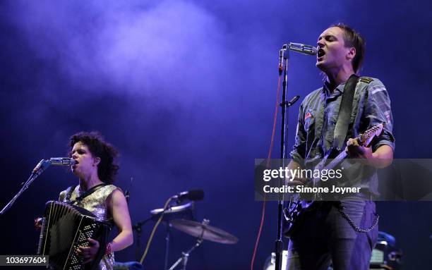 Regine Chassagne and Win Butler of The Arcade Fire performs live on the Main stage during day Two of Reading Festival on August 28, 2010 in Reading,...