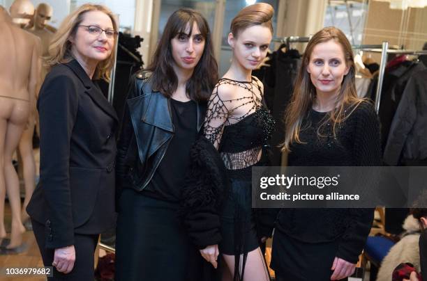 Designers of fashion label Augustin Teboul, Annelie Augustin and Odely Teboul , stand together with Berlin's Senator for Econonmy Cornelia Yzer and a...