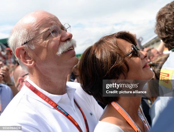 Dieter Zetsche ,CEO of Daimler AG, and his French girlfriend Anne during the German Formula Grand Prix in the Hockenheimring in Hockenheim, Germany,...