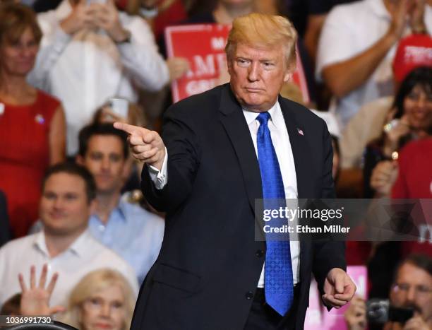 President Donald Trump gestures after speaking during a campaign rally at the Las Vegas Convention Center on September 20, 2018 in Las Vegas, Nevada....