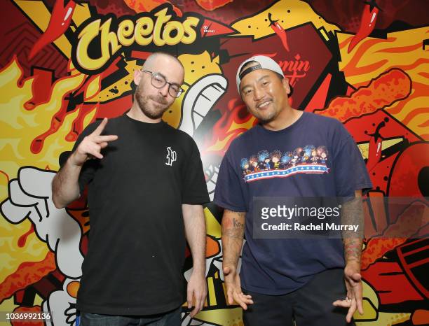 The Alchemist and Roy Choi attend The Flamin Hot Spot, Cheetos new limited-time restaurant with a menu inspired by chef Roy Choi at Madera Kitchen on...