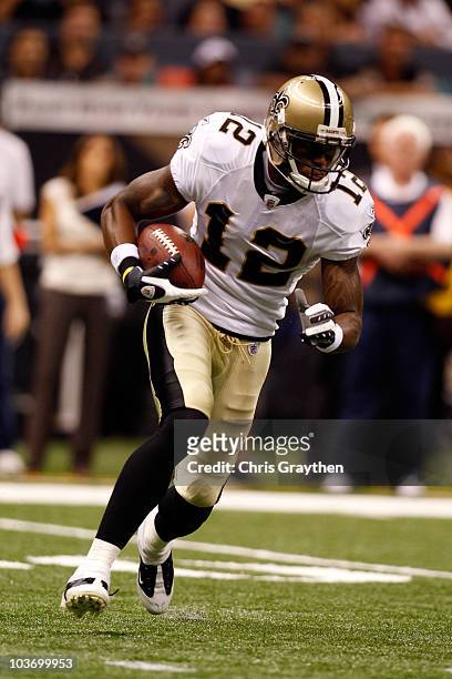 Marques Colston of the New Orleans Saints in action against the San Diego Chargers at the Louisiana Superdome on August 27, 2010 in New Orleans,...