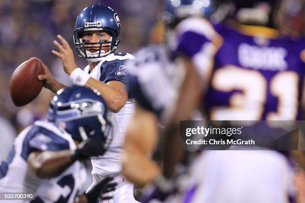 Matt Hasselbeck of the Seattle Seahawks throws a pass against the Minnesota Vikings during a preseason NFL game at Mall of America Field at the...