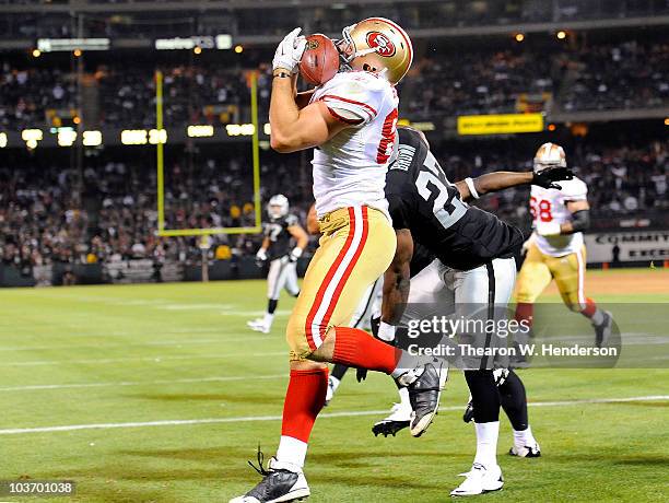 Tight end Nate Byham of the San Francisco 49ers catches the pass from quarterback David Carr for a two point conversion after a touchdown against the...