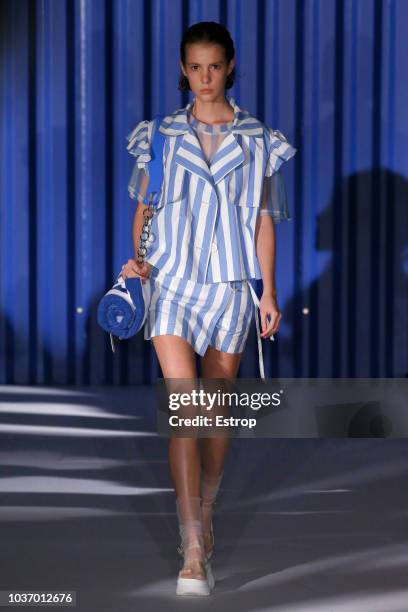 Model walks the runway at the Xiao Li Show during London Fashion Week September 2018 at The BFC Show Space on September 14, 2018 in London, England.