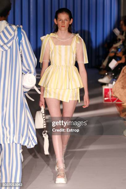 Model walks the runway at the Xiao Li Show during London Fashion Week September 2018 at The BFC Show Space on September 14, 2018 in London, England.