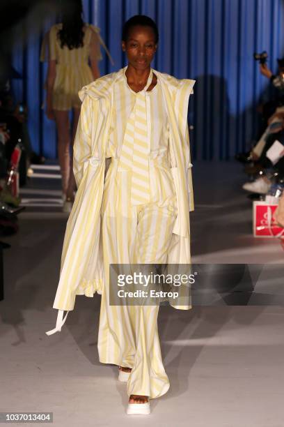 Model walks the runway at the Xiao Li Show during London Fashion Week September 2018 at The BFC Show Space on September 14, 2018 in London, England.