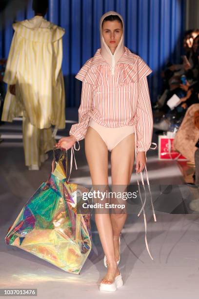 Model walks the runway at the Xiao Li Show during London Fashion Week September 2018 at The BFC Show Space on September 14, 2018 in London, England.