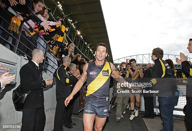 Ben Cousins of the Tigers leads his team into the changing rooms after the round 22 AFL match between the Richmond Tigers and the Port Power at...