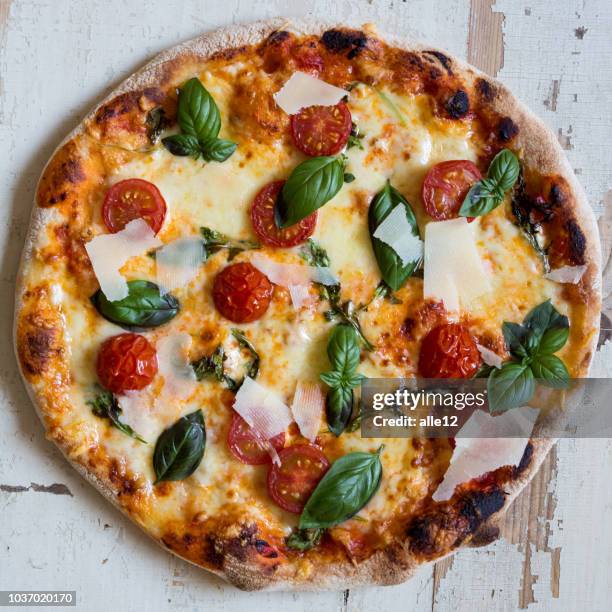 homemade pizza - home made stock pictures, royalty-free photos & images