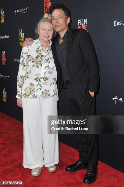 Michelle Phillips and Jakob Dylan arrive at the 2018 LA Film Festival opening night premiere of "Echo In The Canyon" at John Anson Ford Amphitheatre...
