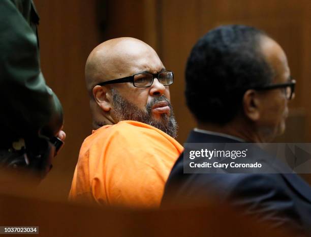 Marion "Suge" Knight, left, shown with his attorney Albert DeBlanc, appears in court pleading no contest to voluntary manslaughter in front of Judge...