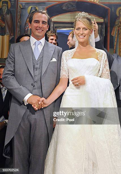 Prince Nikolaos of Greece and Tatania Blatnik pose during their wedding ceremony in the Cathedral of Ayios Nikolaos on August 25, 2010 in Spetses,...