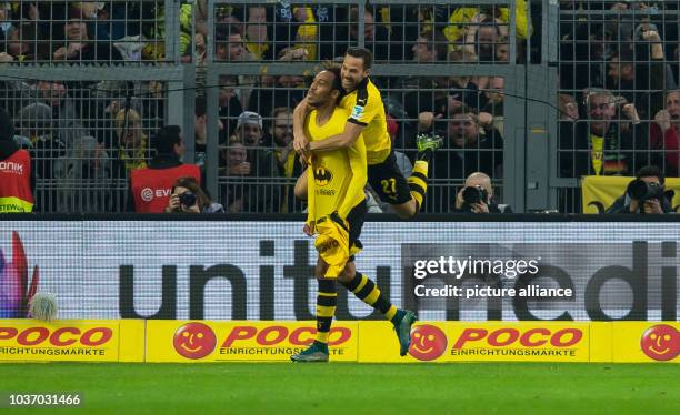 Dortmund's Pierre-Emerick Aubameyang celebrates the goal at 3:1 with Dortmund's Gonzalo Castro during the German Bundesliga soccer match between...