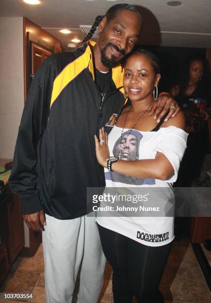Snoop Dogg and his wife Shante Broadus attend the 7th Annual Rock The Bells festival on Governors Island on August 28, 2010 in New York City.