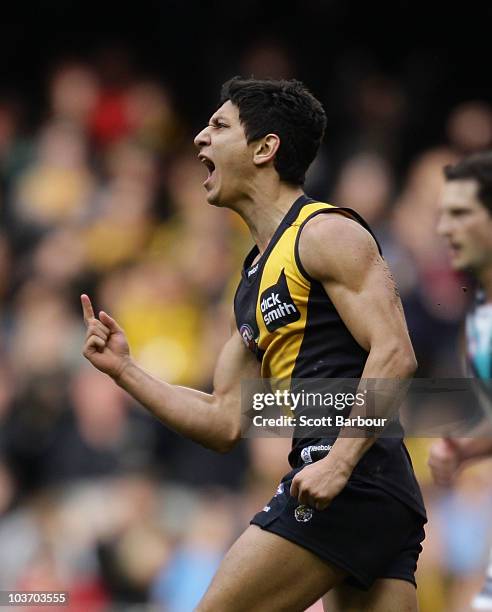 Robin Nahas of the Tigers gestures after kicking a goal during the round 22 AFL match between the Richmond Tigers and the Port Power at Etihad...