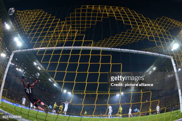 Dortmund's Robert Lewandowski scores the goal 3-1 against Madrid's goalkeeper Diego Lopez during the UEFA Champions League semi final first leg...