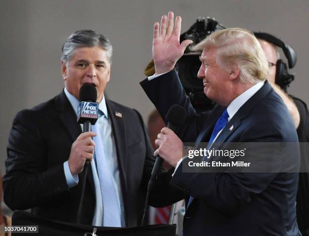 Fox News Channel and radio talk show host Sean Hannity interviews U.S. President Donald Trump before a campaign rally at the Las Vegas Convention...