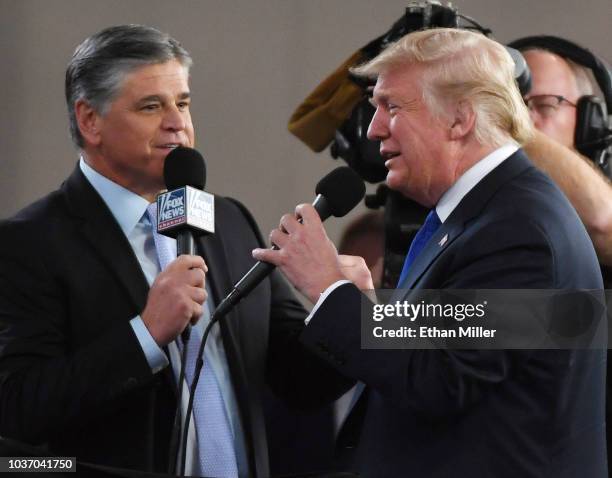 Fox News Channel and radio talk show host Sean Hannity interviews U.S. President Donald Trump before a campaign rally at the Las Vegas Convention...