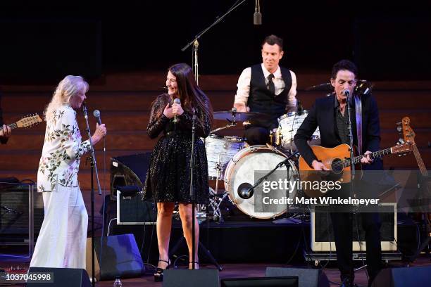 Michelle Phillips, Jade Castrinos, and Jakob Dylan perform during the 2018 LA Film Festival opening night premiere of "Echo In The Canyon" at John...