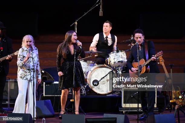 Michelle Phillips, Jade Castrinos, and Jakob Dylan perform during the 2018 LA Film Festival opening night premiere of "Echo In The Canyon" at John...