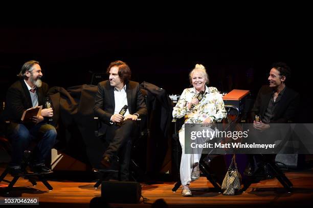 Andrew Slater, Michelle Phillips, and Jakob Dylan speak onstage during the 2018 LA Film Festival opening night premiere of "Echo In The Canyon" at...