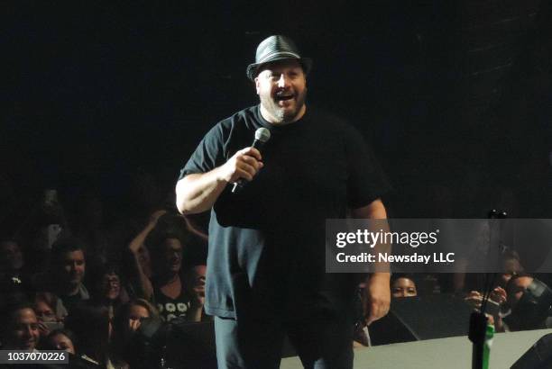 Kevin James joins Billy Joel during the final concert at the Nassau Coliseum on August 4, 2015 in Uniondale, New York.