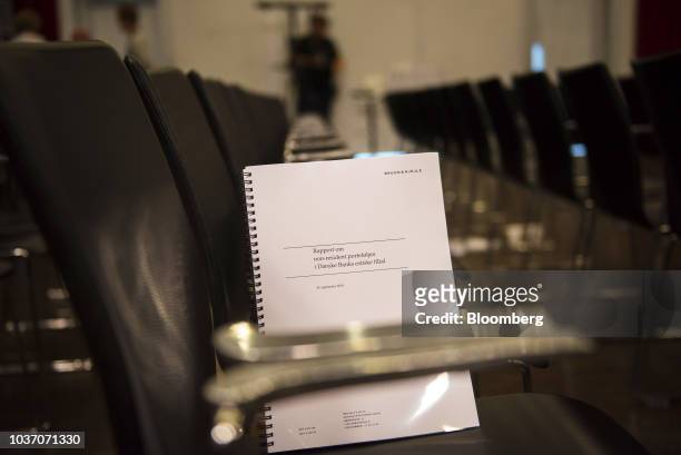 Copy of the 87-page report into the operations of the Estonian branch of Danske Bank A/S sits on display at a news conference following its release...