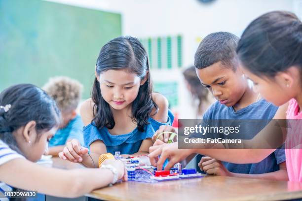 group learning with the stem curriculum - lunar module stock pictures, royalty-free photos & images