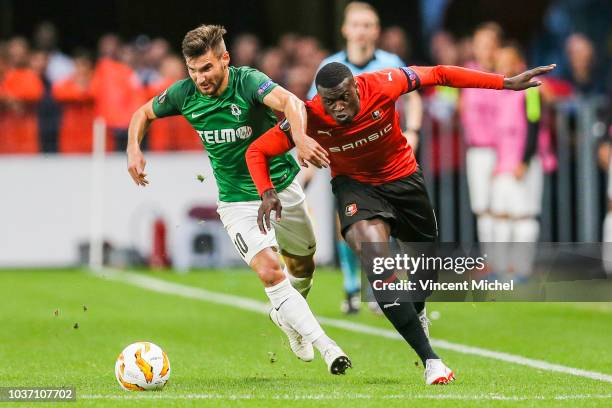 Mbaye Niang of Rennes and Michal Travnik of Jablonec during the Europa League match between Rennes and Jablonec at Roazhon Park on September 20, 2018...