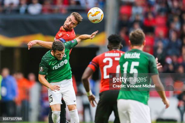 Damien Da Silva of Rennes and Vladimir Jovovic of Jablonec during the Europa League match between Rennes and Jablonec at Roazhon Park on September...