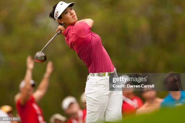 Michelle Wie of the U.S. Follows through on a tee shot during the final round of the CN Canadian Women's Open at St. Charles Country Club on August...