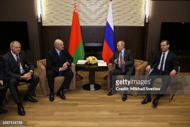 Russian President Vladimir Putin , Russian Prime Minister Dmitry Medvedev , Belarussian Prime Minister Sergei Rumas and Belarussian President...