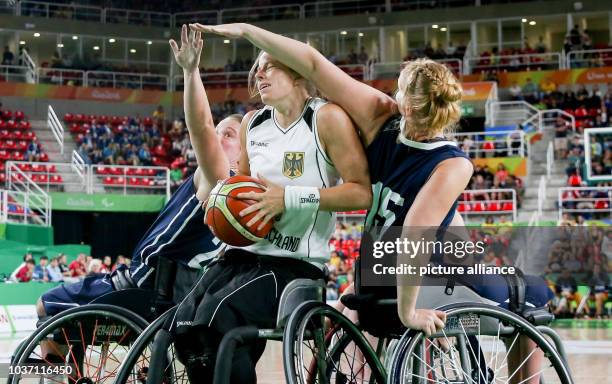 Gesche Schuenemann of Germany in action against Rose Hollermann of the US during the women's wheelchair basketball gold medal match between Germany...