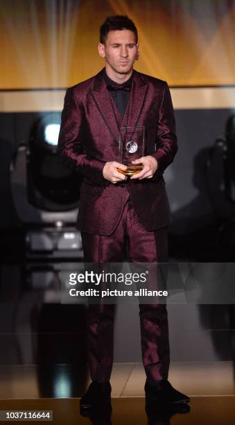 Barcelona's Lionel Messi of Argentina on stage during the FIFA Ballon d'Or Gala 2014 held at the Kongresshaus in Zurich, Switzerland, 12 January...