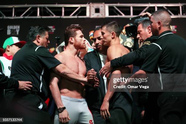 Boxers Saul Alvarez and Gennady Golovkin face to face during the official Weigh-in at T-Mobile Arena on September 14, 2018 in Las Vegas, Nevada.