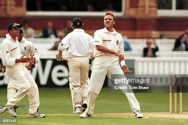 Allan Donald of Warwickshire celebrates taking the wicket of Tim Hancock of Gloucester during the Natwest Trophy final between Gloucester and...