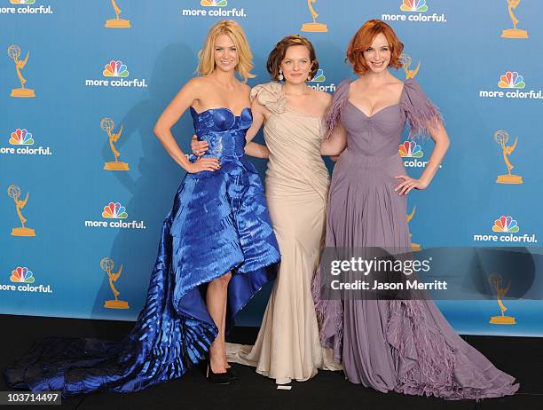 Actresses January Jones, Elisabeth Moss and Christina Hendricks, winners of the Outstanding Drama Series Award for "Mad Men," pose in the press room...