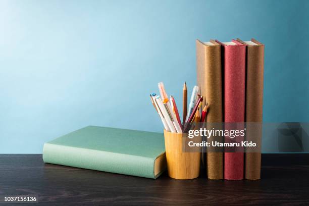 desk. - book minimal stock pictures, royalty-free photos & images