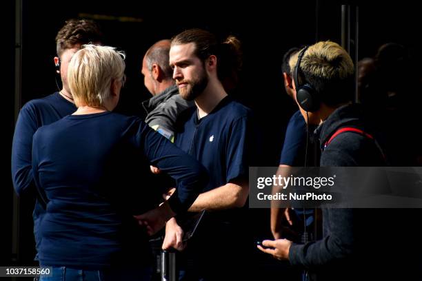 People queue outside the Apple Store at Regent Street as Apple launch the new iPhone XS, London on September 21, 2018. Apple have today launched...