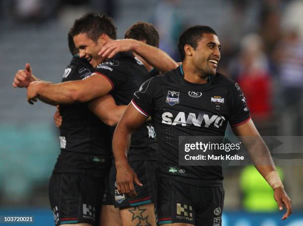 Michael Jennings of the Panthers celebrates after scoring the winning try after the final siren during the round 25 NRL match between the Canterbury...