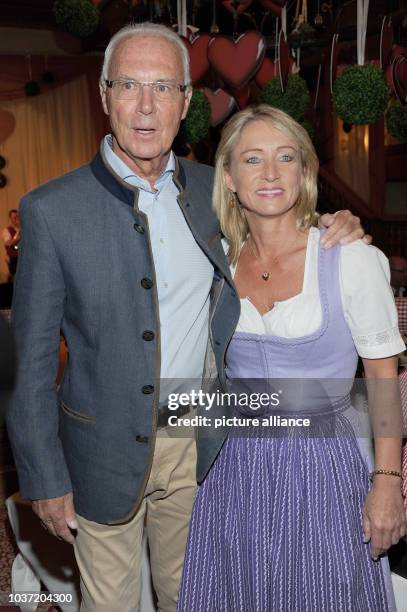 Franz Beckenbauer and his wife Heidrun pose at the get-together of the Bavarian evening in the context of the 29th Kaiser Cup golf tournament of the...