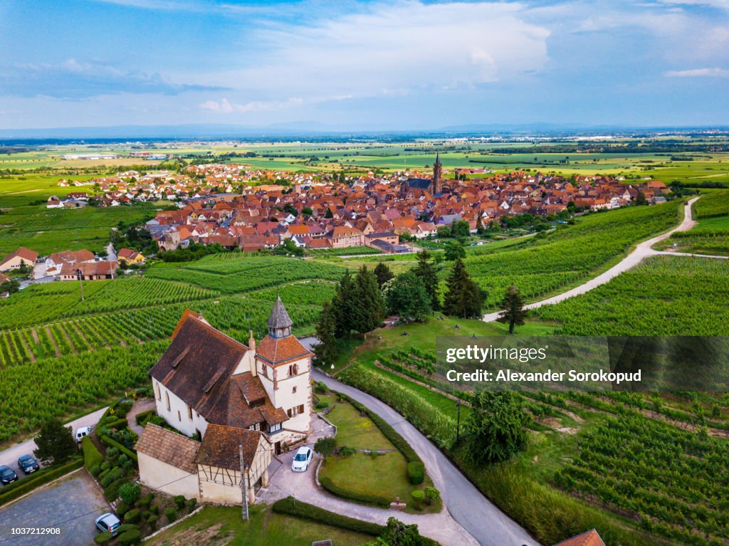 Little french village Dambach-la-ville and medieval church panoramic aerial view, Alsace, France
